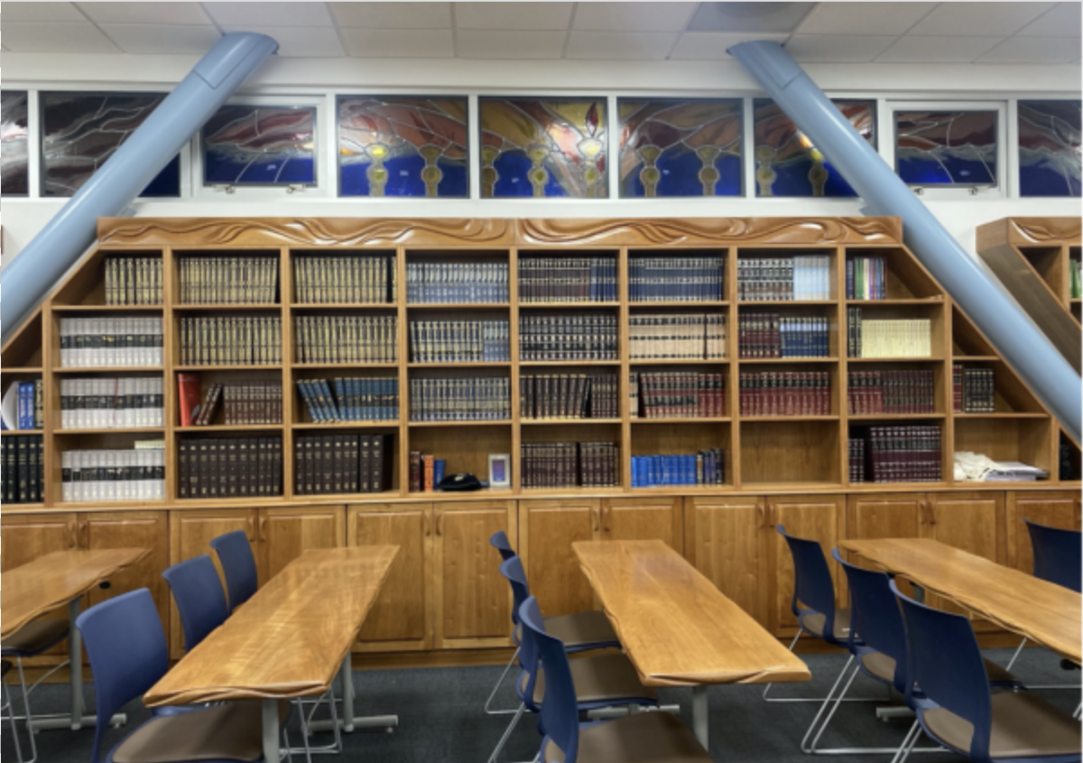 BOOKSHELVES: Sets of Shas, Mishneh Torah and commentaries on Tanach are among the many sefarim purchased to fill the Beit Midrash shelves.
